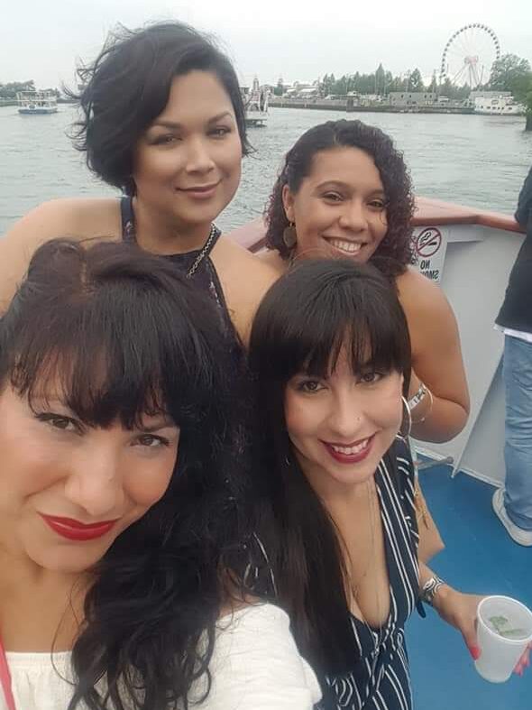 four women on boat cruise